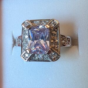 Sparkling emerald cut amethyst ring